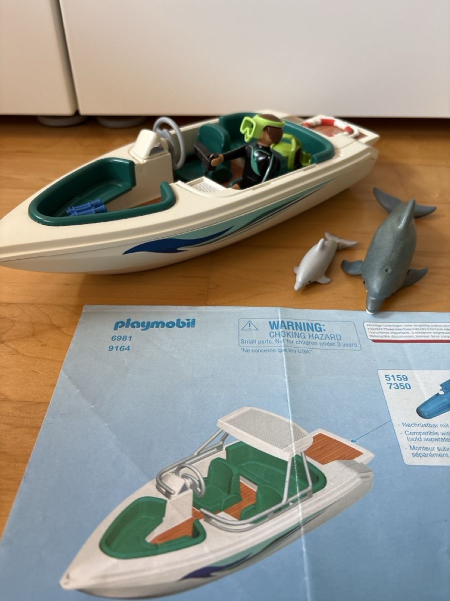 Playmobil Spielzeuge: Playmobil Speedboot mit Taucher und Delfinen – Gebraucht aus Nottwil von wasserlufterde