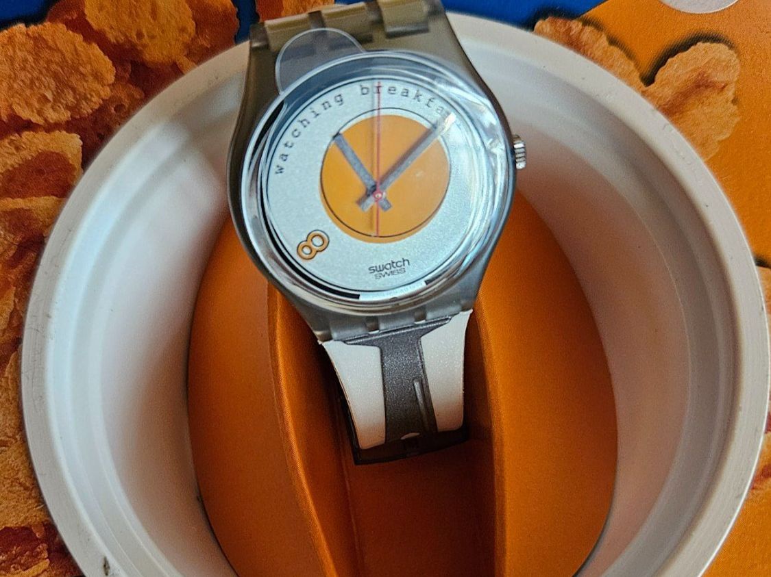 Swatch Montres: Montre Swatch "Timeless Nice Popsies" & "Watching Breakfa... – D'occasion à St-Barthélemy VD par trak98p 1