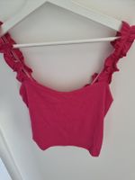Pinkes Top mit Rüschen