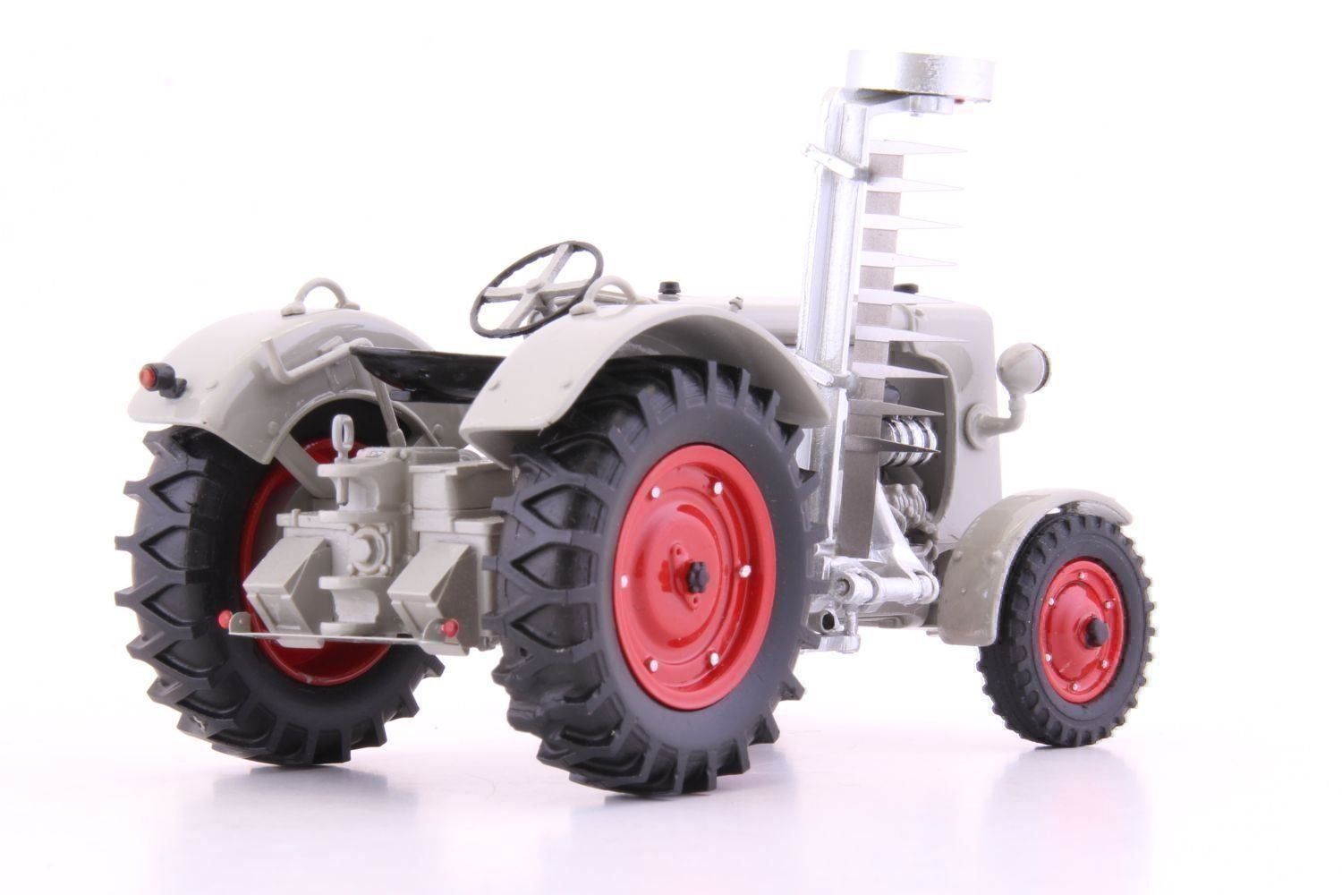 Hürlimann Modellini d'auto: HÜRLIMANN TRAKTOR D200 MIT EGGE 1:32 – Nuovo e nell'imballaggio originale da Suhr venduto da Moebelsiralfred 1
