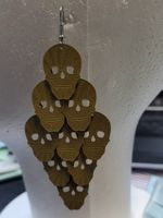 Goldfarbene Totenkopf-Ohrringe