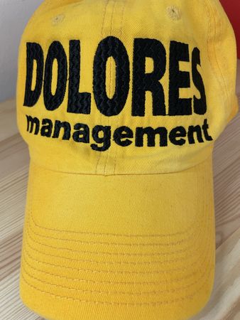 DOLORES MANAGEMENT BRAND NEW CAP
