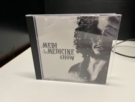 Medi and the Medicine Show - X01A