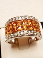 Fingerring mit gel-orangen Safiren