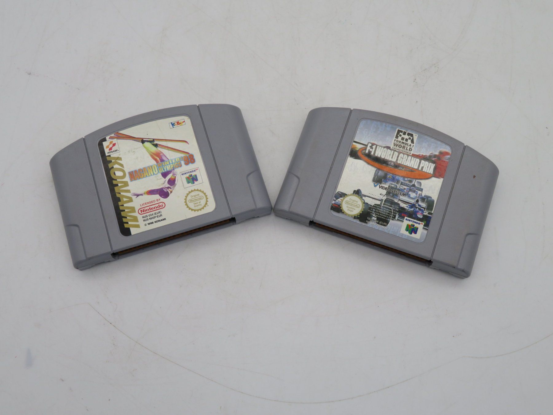 Nintendo Jeux: N64 Formel 1 & Olympische Winterspiele 98 – D'occasion à Reinach BL par WBZ-Flohmarkt