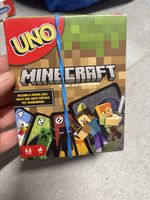 Jeu UNO Minecraft boîte abîmée mais jeu neuf