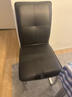 Freischwinger Stuhl in Schwarz mit Chromgestell gebraucht