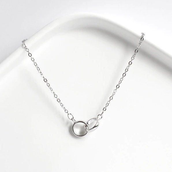 Bracciali & Braccialetti: Doppel Ring Armband aus Silber – Nuovo e nell'imballaggio originale da Wil SG venduto da Veratier