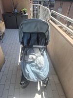 Poussette Bugaboo bleu ciel + chancelière et housse.