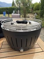 Lotus Grill barbecue portable 43.5 cm noir avec accessoires