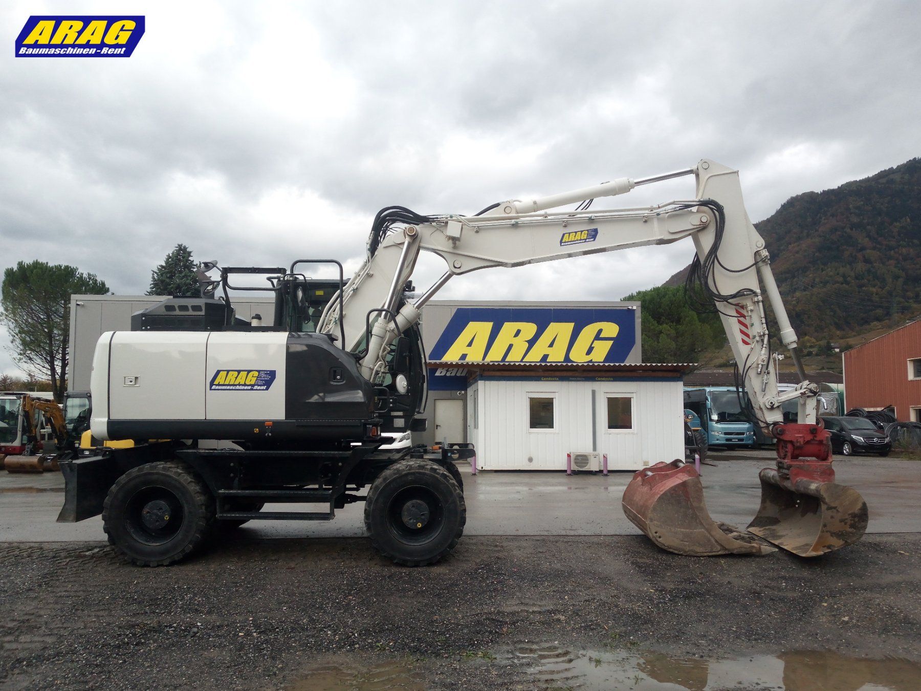 Hitachi Escavatori: Hitachi ZX 140 W-6 Pneubagger – Usato da Hasle LU venduto da Arag08 1