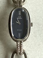 Montre Omega De Ville argent femme boitier ovale, bracelet g
