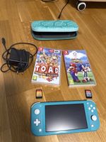 Nintendo Switch Lite blau inkl. Spielen und Hülle