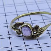 Filigraner Goldring mit Sativ Edelstein