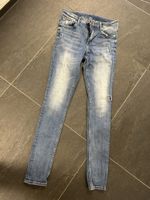 Jeans bleu délavé