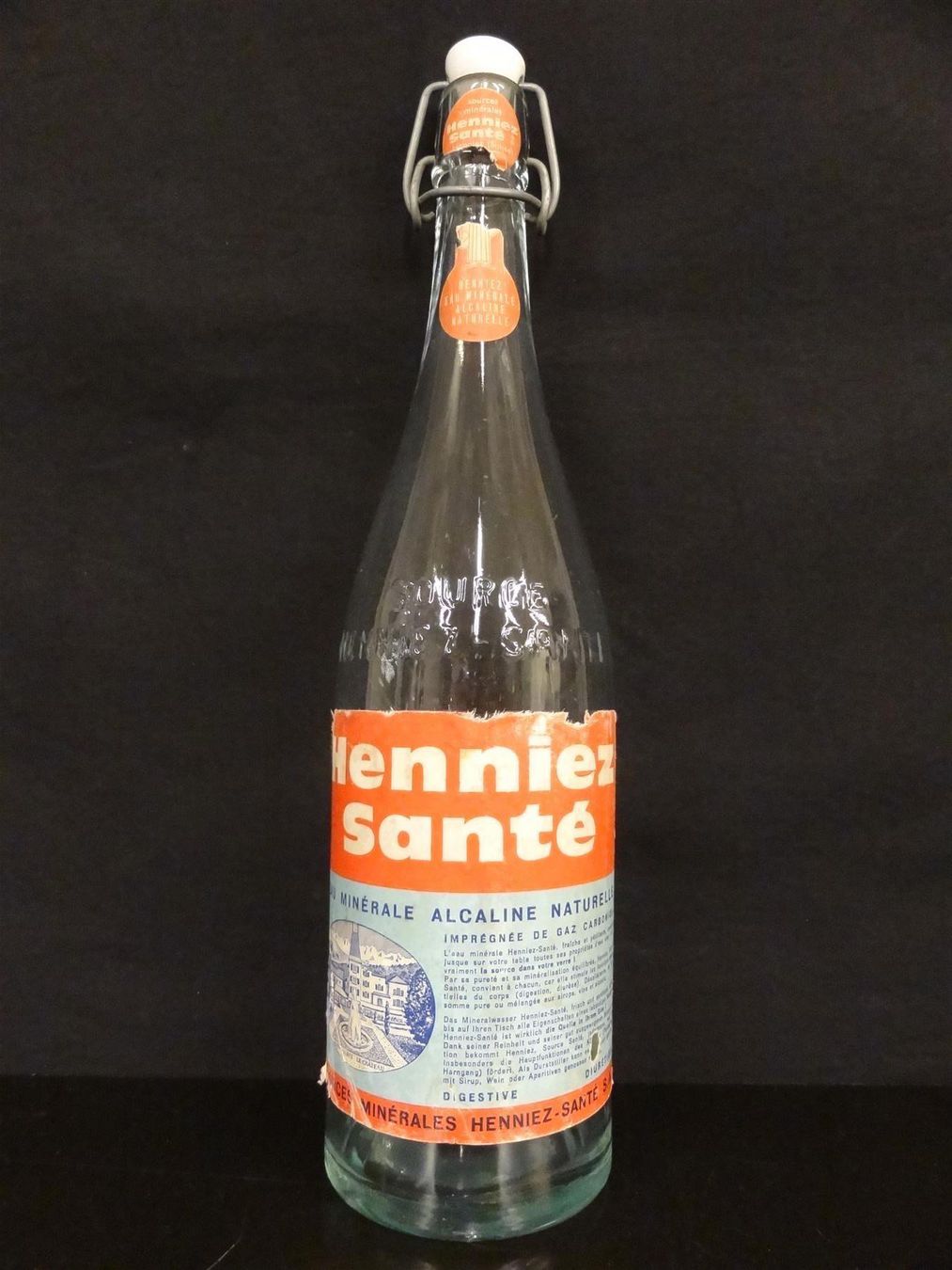 Bicchieri, Caraffe & Bottiglie: alte Flasche HENNIEZ SANTÉ – Usato da Kerzers venduto da Flaschenposten