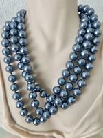 Perlen ohne Ende: Muschelkernperlen-Kette 146cm Handgeknüpft