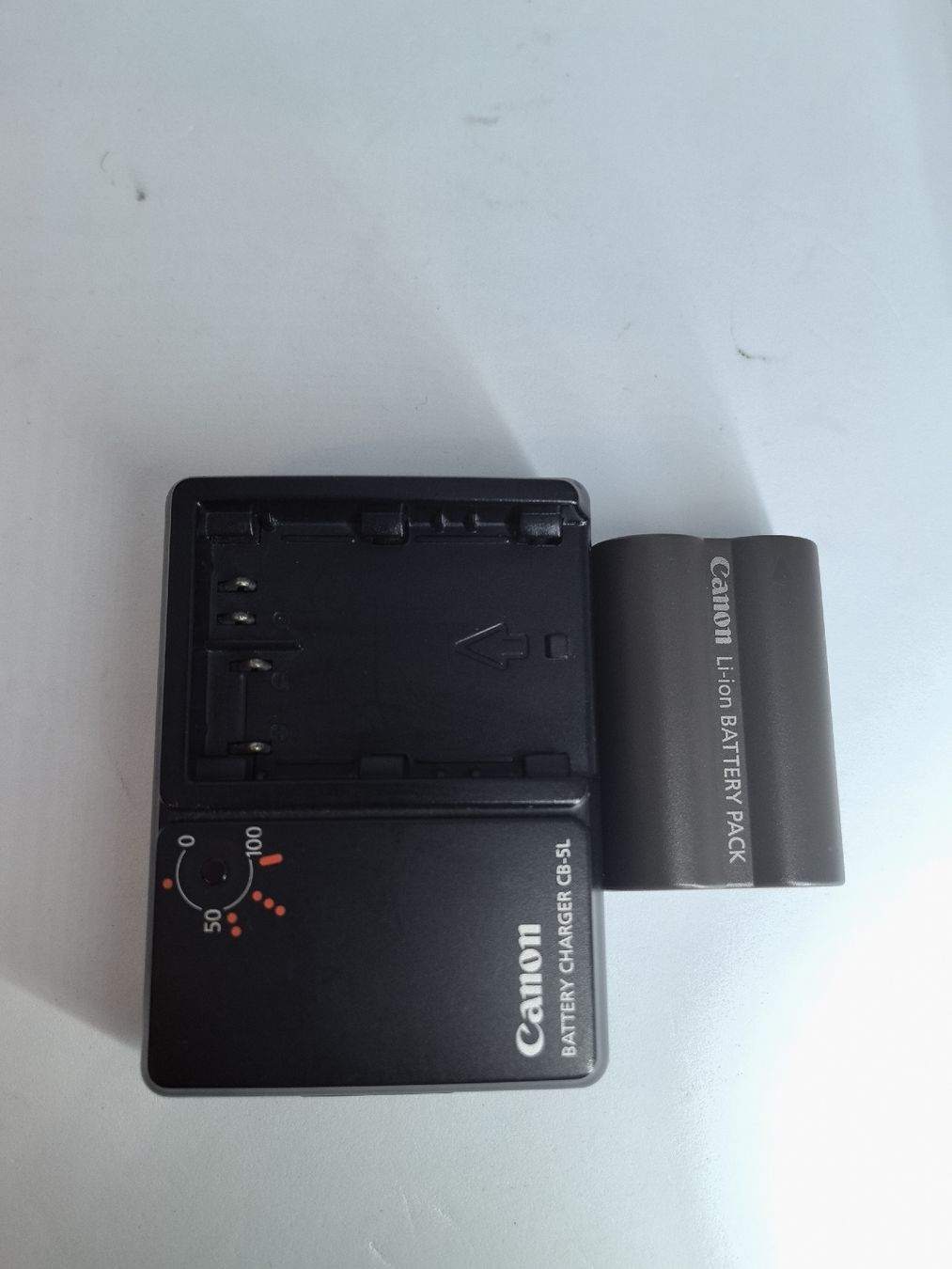 Canon Altri Accessori: Canon charger CB-5L + BATTERY – Usato da Uster venduto da TOPPRICEE