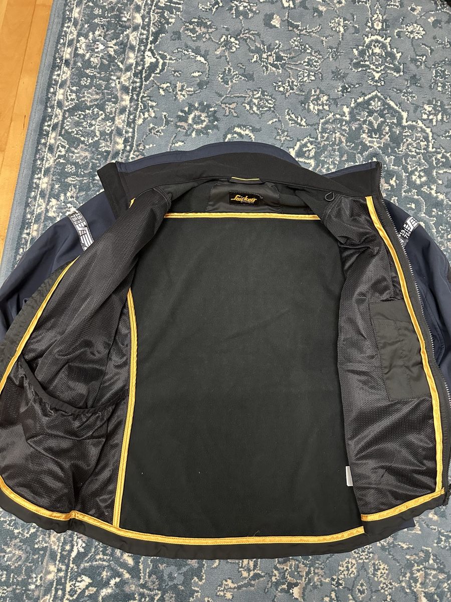 Snickers Giacche: Snickers Workwear Softshell Jacke blau  – Usato da St. Gallen venduto da 987JDBA 1