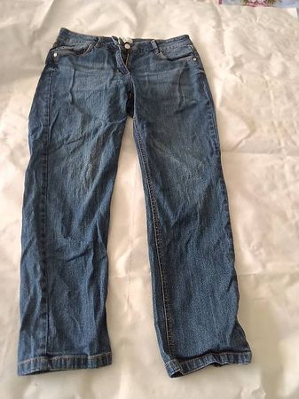 Jeans bleu couture orangées
