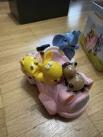 Salvadanaio animali su auto rosa ceramica