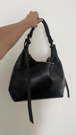 Handtasche Mandel Croissant Midi schwarz Leder