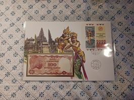 Indonesien Banknotenbrief mit 100 Rupiah Note.