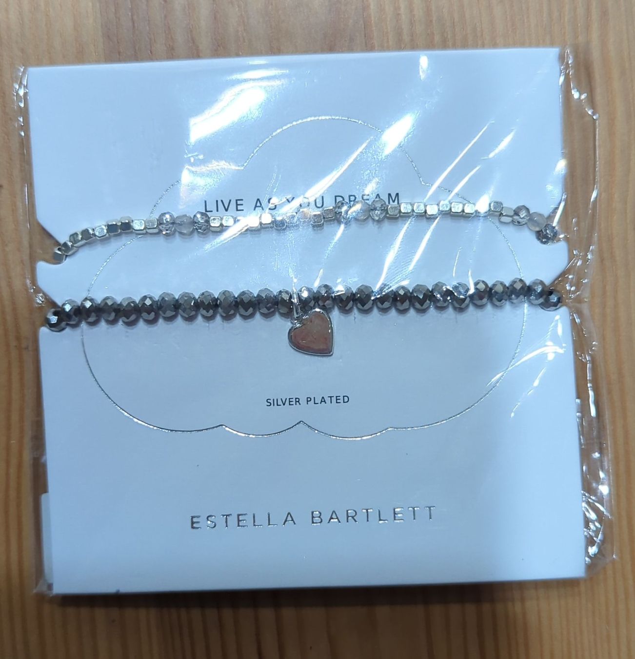 Bracciali & Braccialetti: Estella Bartlett Armbänder Silber Grau OVP Sommer schmuck – Nuovo e nell'imballaggio originale da Winterthur venduto da Glauriane