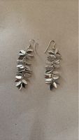 Boucles d'oreille fantaisie pendantes,couleur argent, neuves