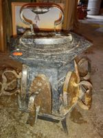 Fourneau pour fers à repasser
