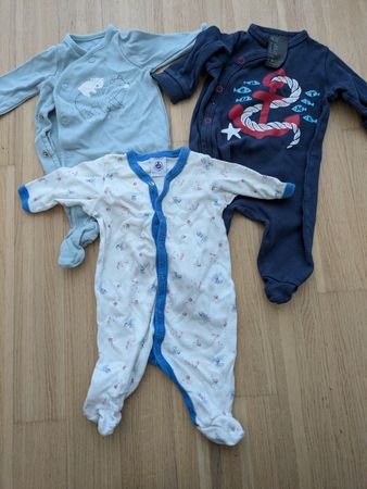 3 Sweet Newborn baby outfits (size 50)