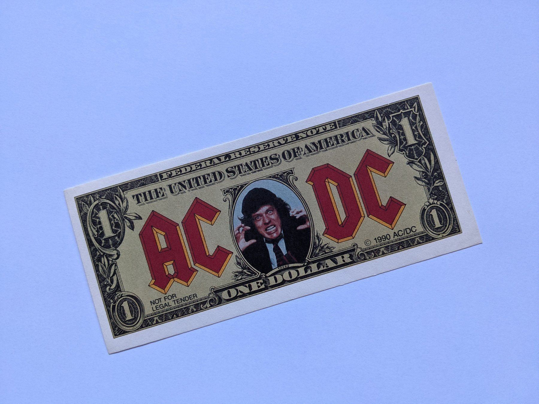 Banconote: ORIGINAL One Dollar AC/DC (1990) – Usato da Marbach LU venduto da Fabbe