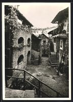 AK Arcegno, Motivo, Gasse mit Gebäude