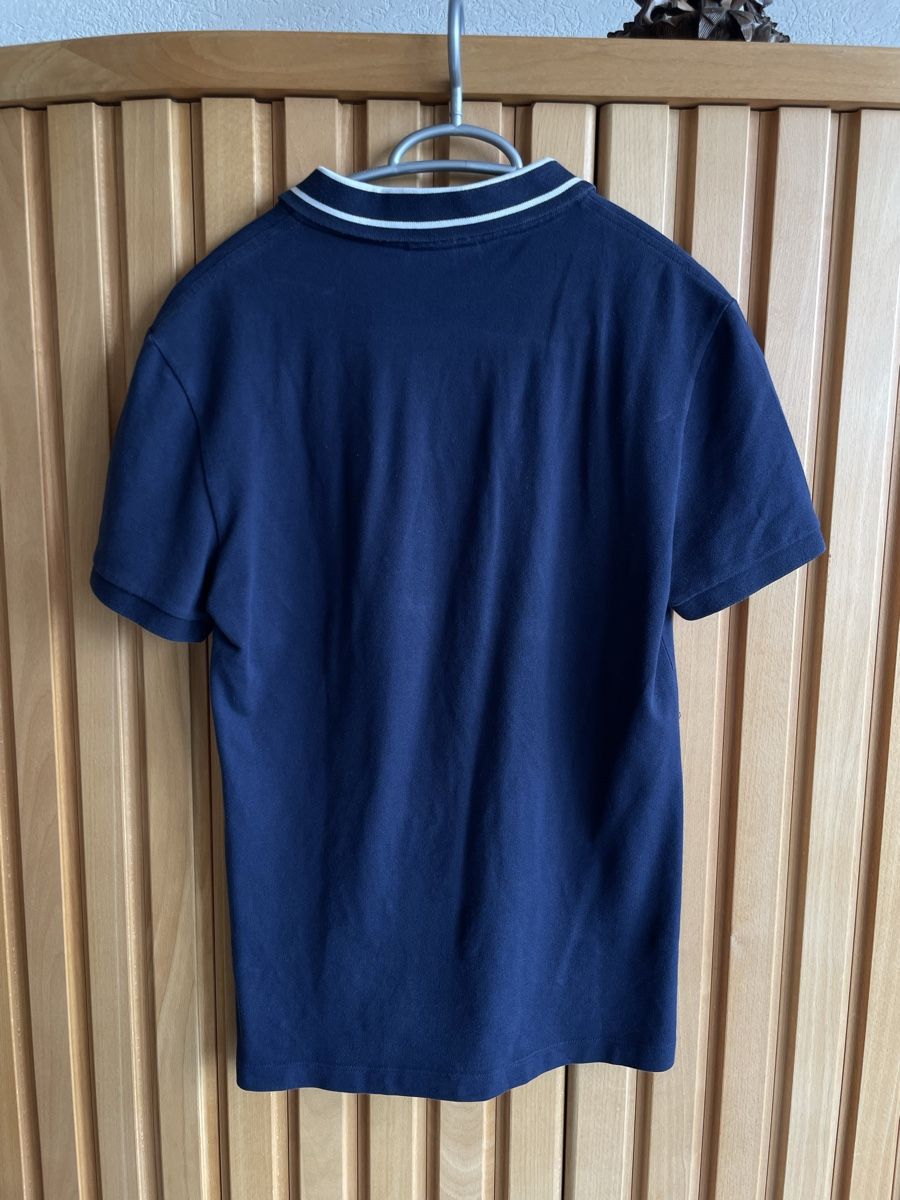 Lacoste Magliette Polo: Polo Lacoste bleu marine - édition limitée - S – Usato da Onnens VD venduto da Slyce 1