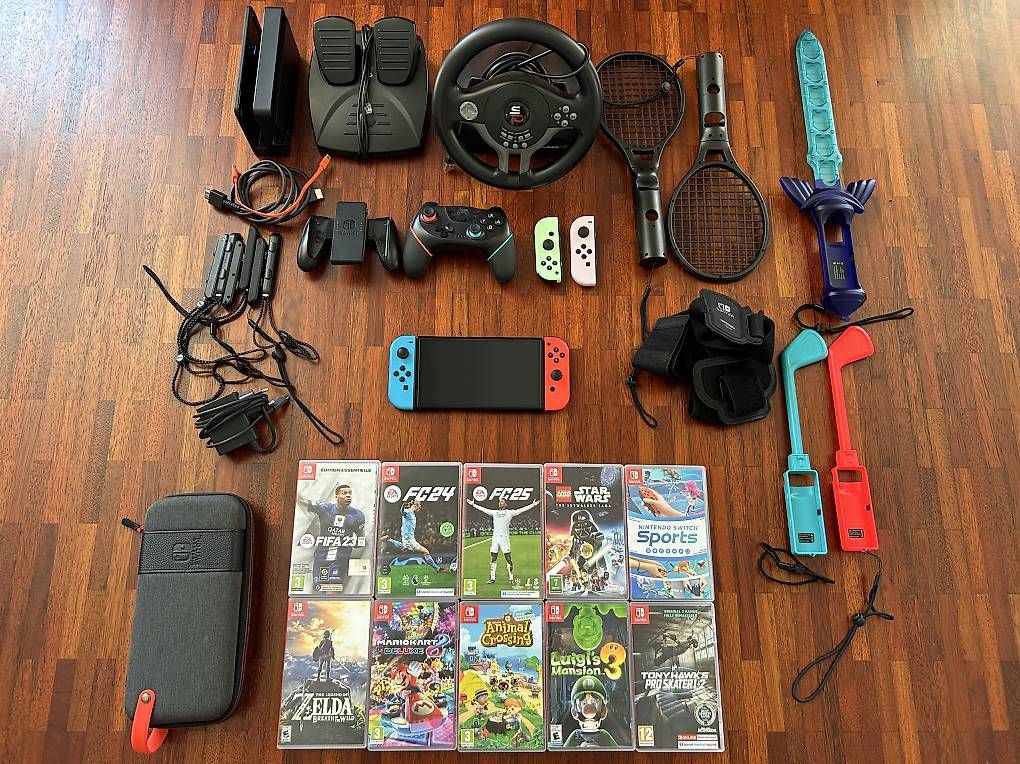 Nintendo Console: Console Nintendo Switch OLED avec accessoires et 10 jeux – Usato da Lausanne venduto da GH4
