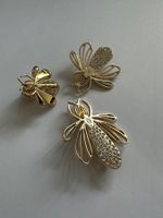 Guerlain bee brooch set, gold coloured