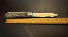 Coltello pieghevole vecchio manico in corno 