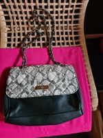 Handtasche