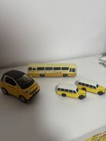 4 Modelle von Postfahrzeugen