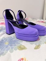 DÉCOLLETÉ CON PLATEAU E TACCO COLOR VIOLA/LILLA.