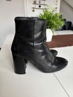 Bottines à talon noire en cuir