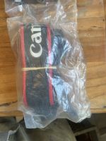 Kameragurt Canon schwarz rot fast neu in Verpackung
