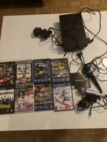 PlayStation 2 PS2 FAT + 8 jeux + SingStar + 2 micros + manet
