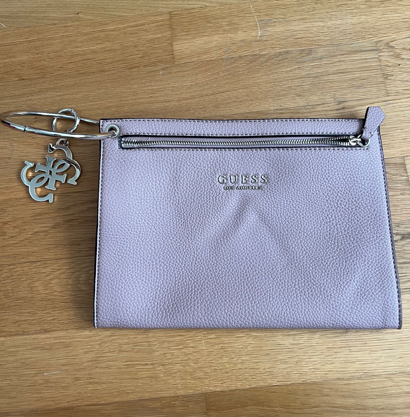 Guess Borse da donna: Guess Clutch – Usato da Sternenberg venduto da Coocoo