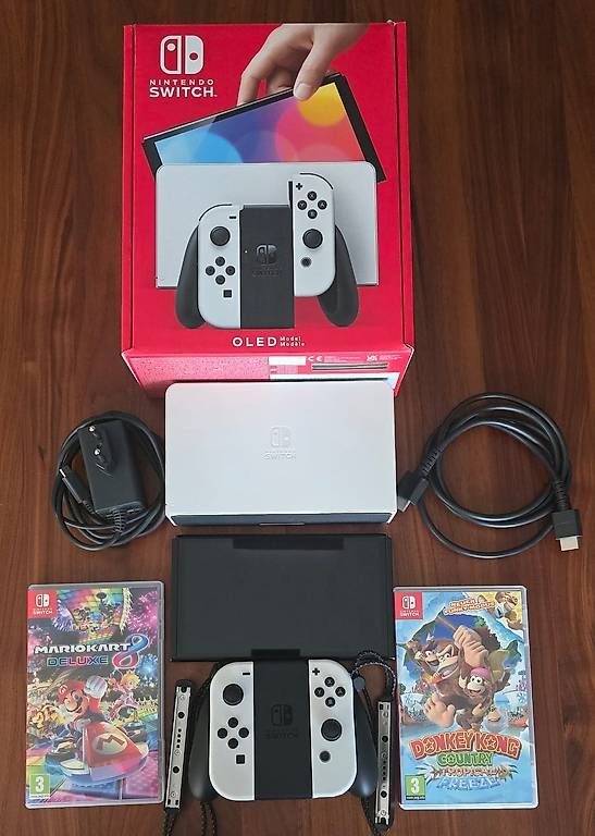 Consoles: Nintendo Switch (OLED-Modell) + 2 Spiele – D'occasion à Seon par LaZZo