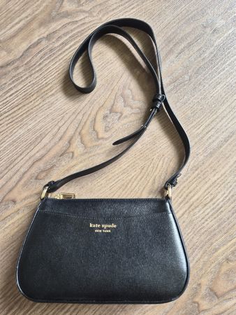 Sac Kate Spade noir bandoulière, élégant et pratique.