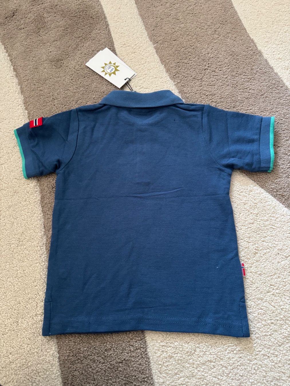 Trollkids Chemises, T-shirts & Polos: POLO T-SHIRT UPF 30+ – Neuf avec emballage d'origine à Zürich par Mina_09 2