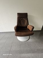 Brauner Leder Sessel mit Drehfuss