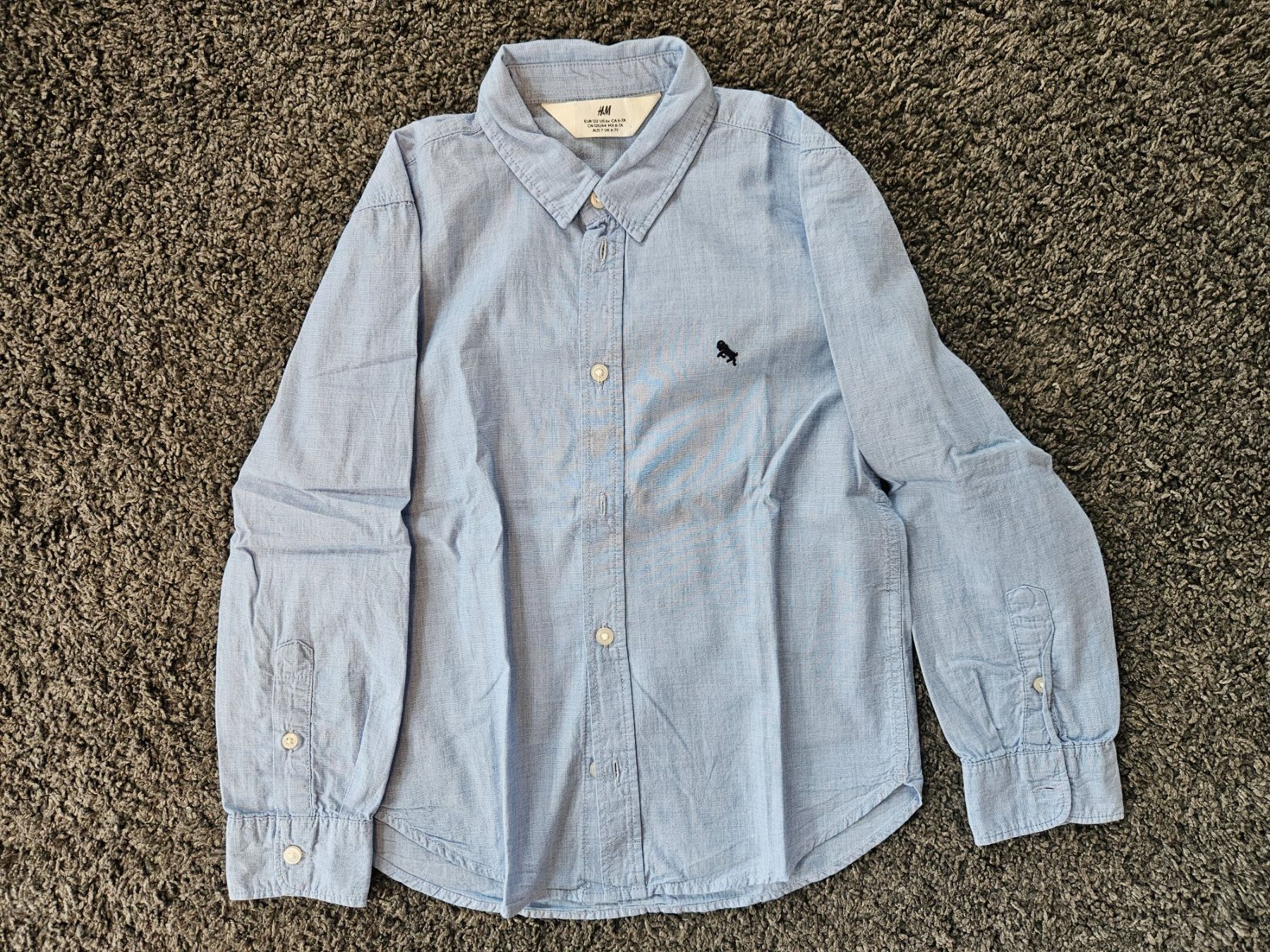 H&M Camicie, T-shirt & Polo: Hemd langarm hellblau Grösse 122 – Usato da Marthalen venduto da Himbeersugus