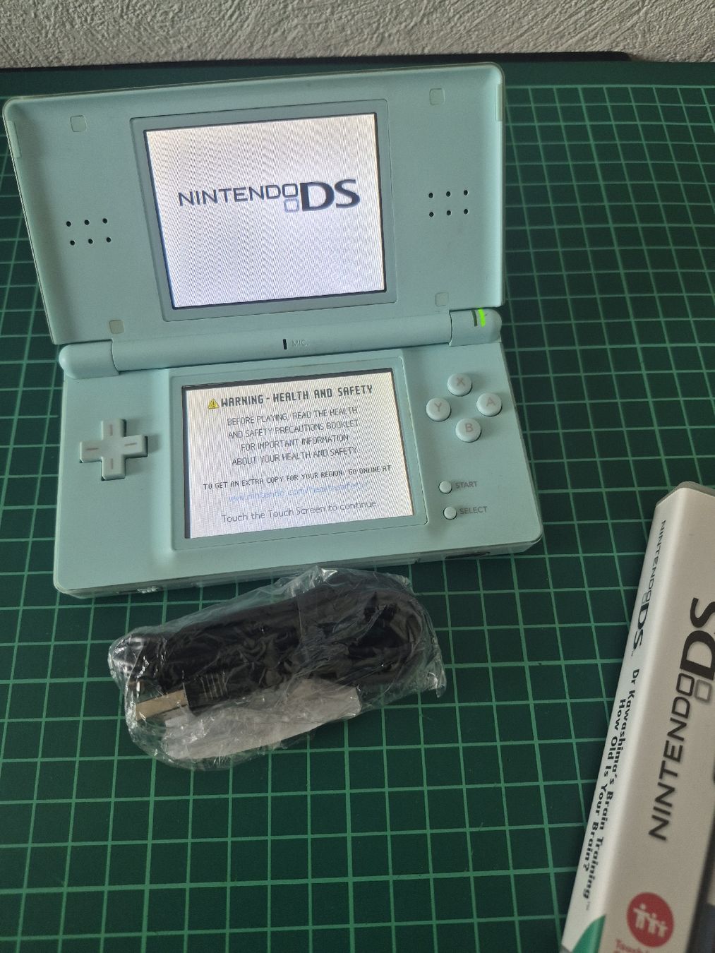 Nintendo Konsolen: Nintendo DS Lite Aqua Blue Bundle with Brain Training – Gebraucht aus Meyrin von Retro-GZ 1